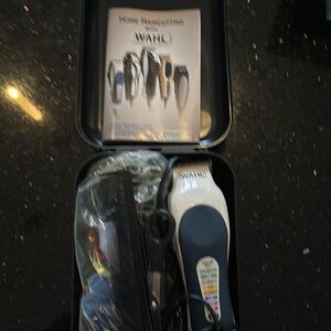 WAHL home haircutting NIB comes 12 attachment guards & operating instructions